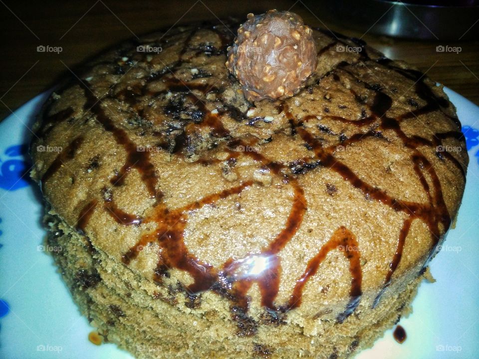 homemade chocolate cake with ferrerorocher on the top...