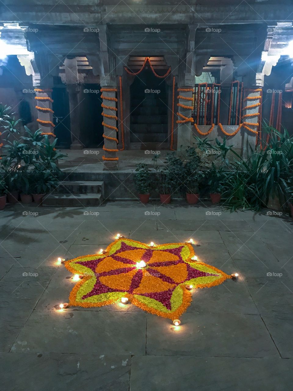 Diyas; oil lamps & flowers ..