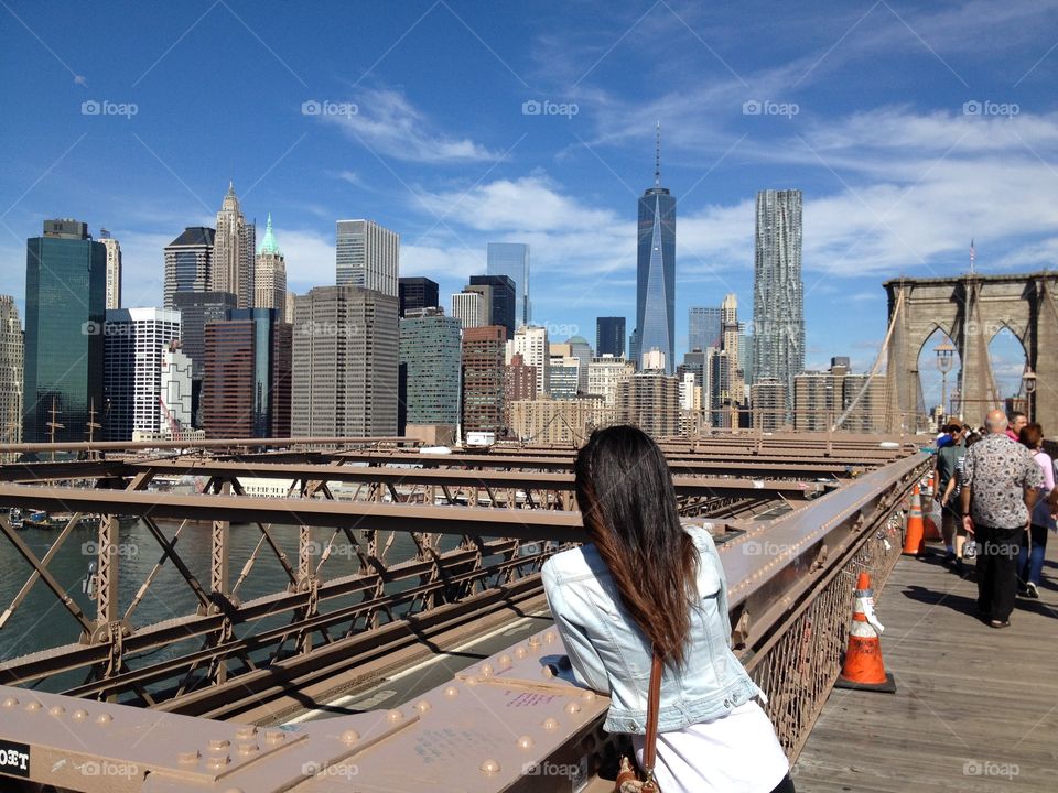 Woman's think. On the Brooklyn bridge