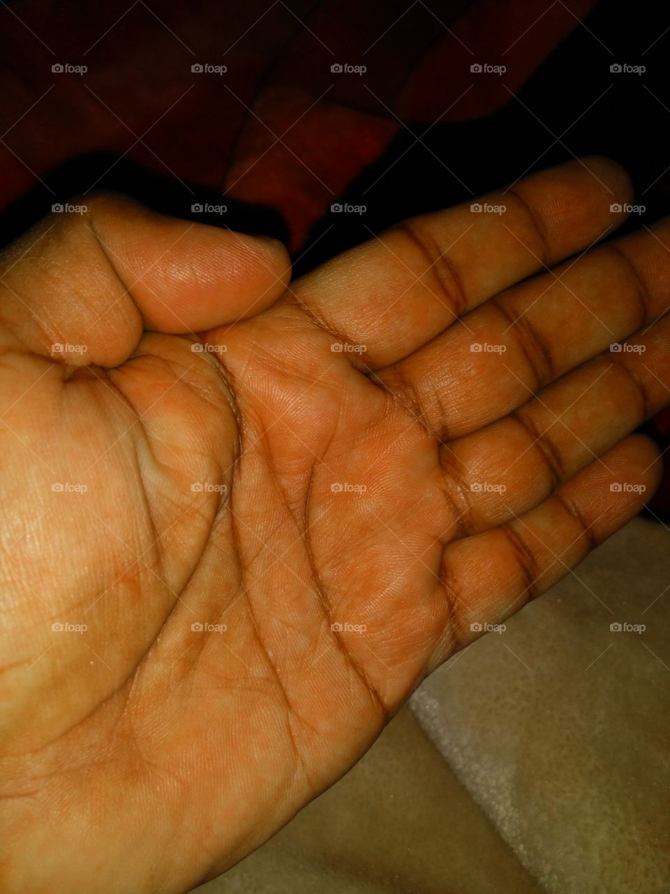 my palm under flash light .