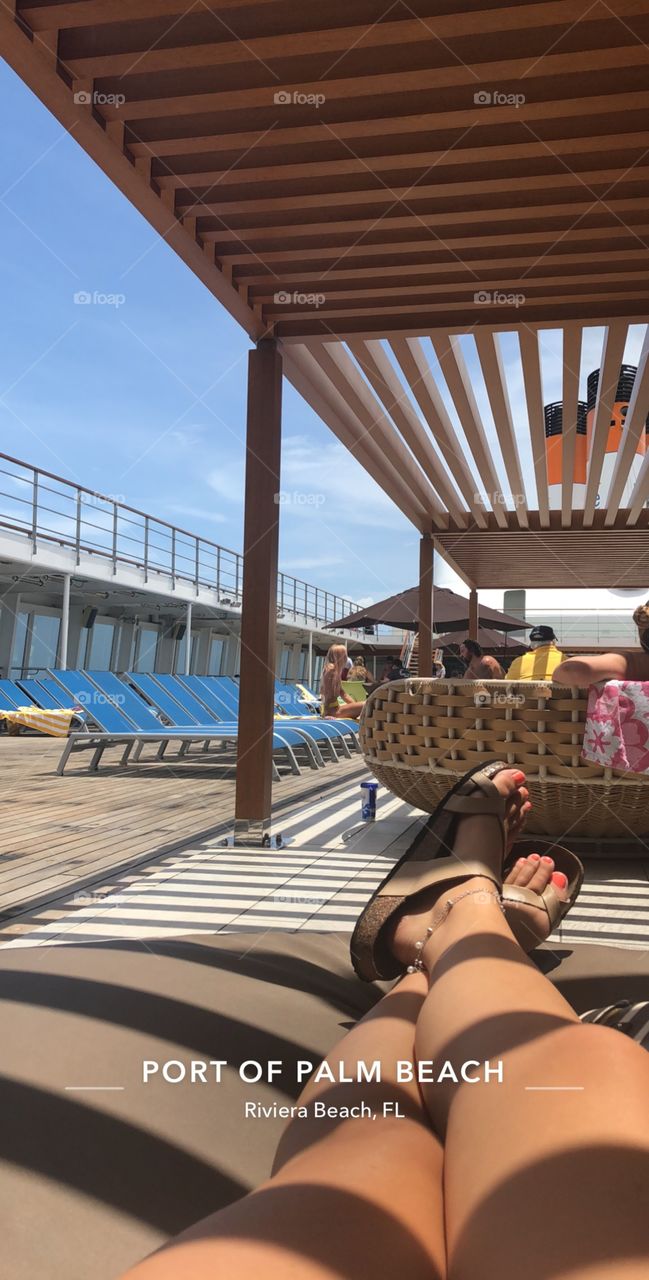 Nothing like relaxing on the gorgeous carnival cruise in the sun on a swivel chair at west palm port! 