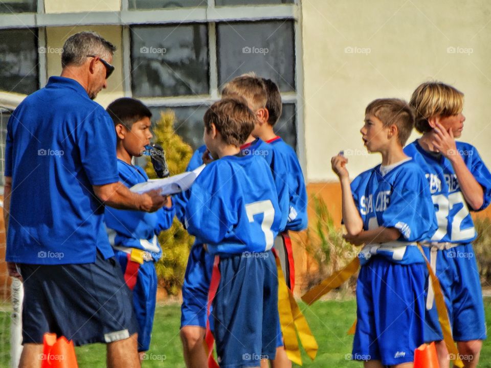 Kids Playing Football
