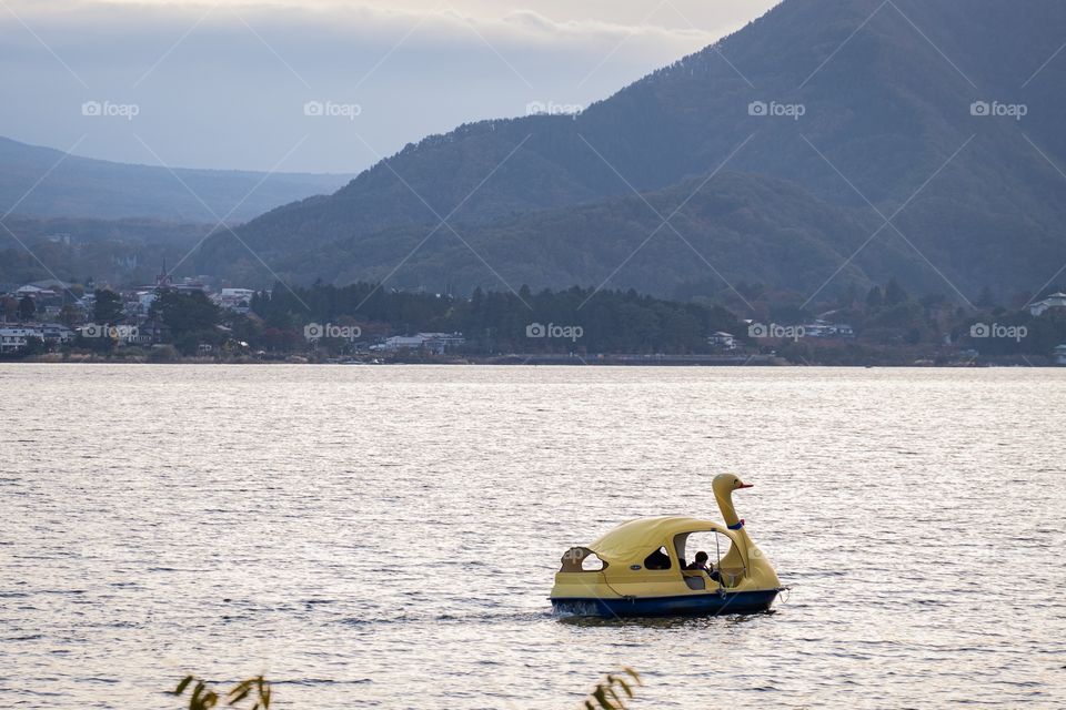 Fuji mountain and yellow duck in Kawaguchiko lake in Japan