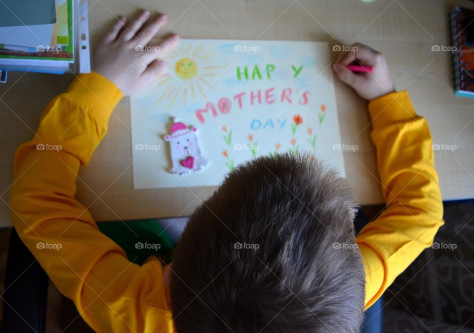 child boy drawing pencils, creative kind