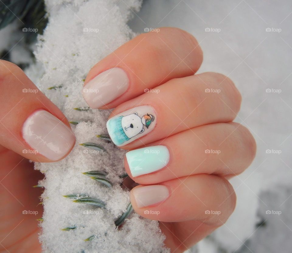 female hand with winter manicure