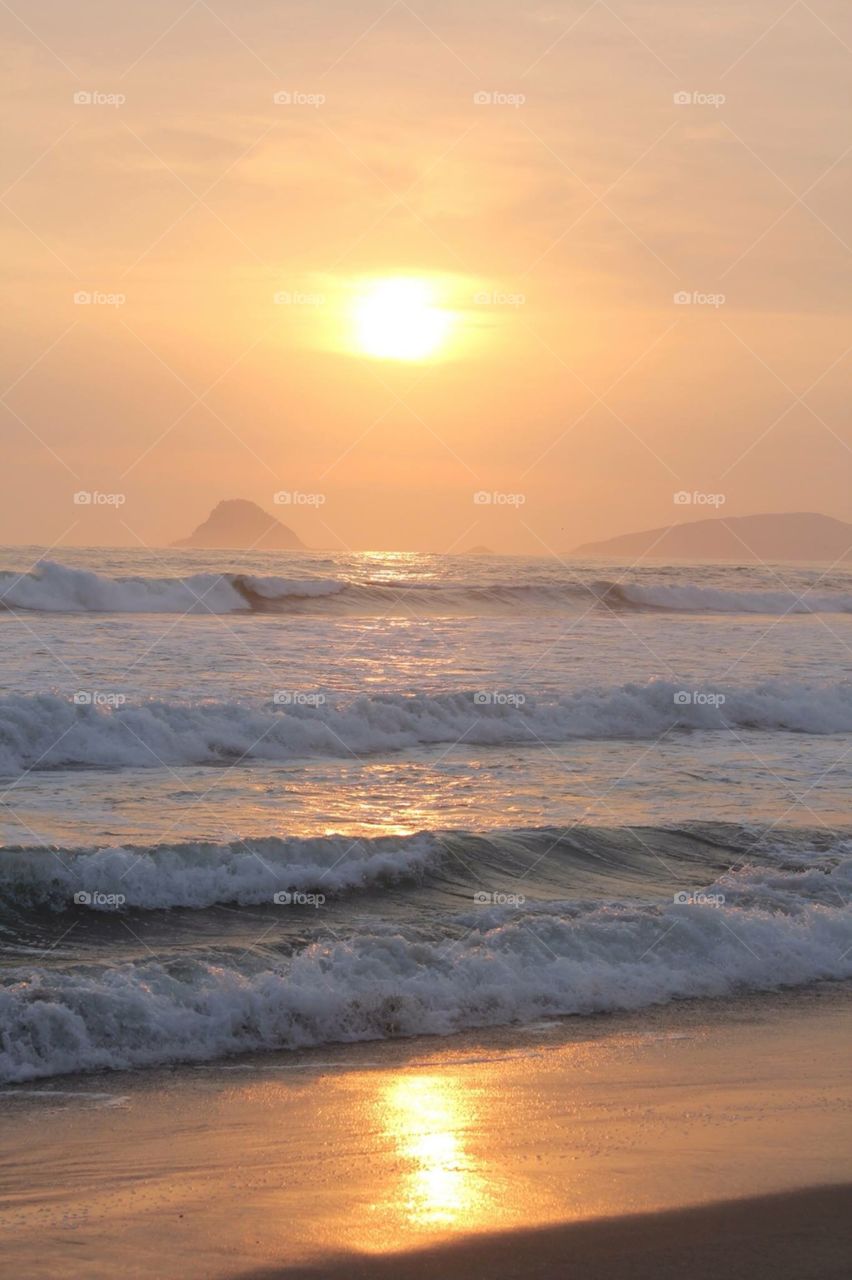 Ocean Waves Reflecting Sun 