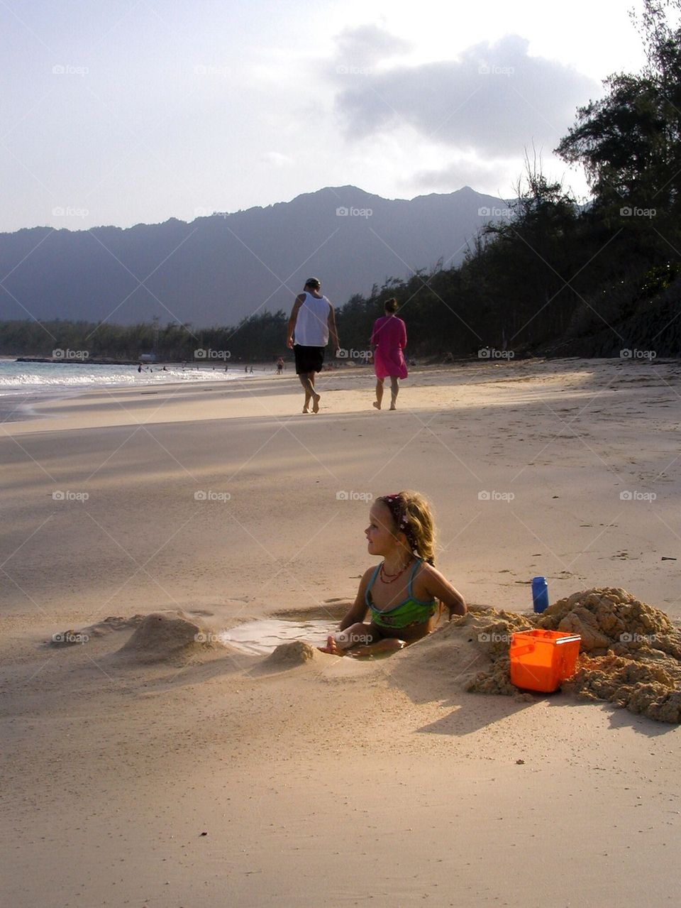 Girl playing in the sand