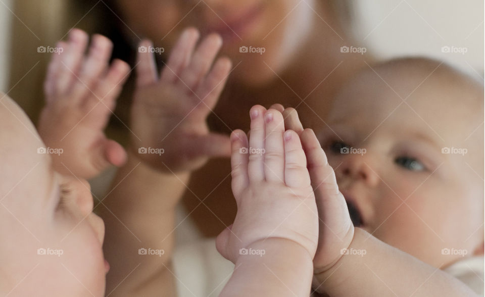 Baby hands on mirror