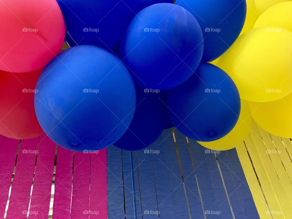 Crepe paper curtain and colorful balloons