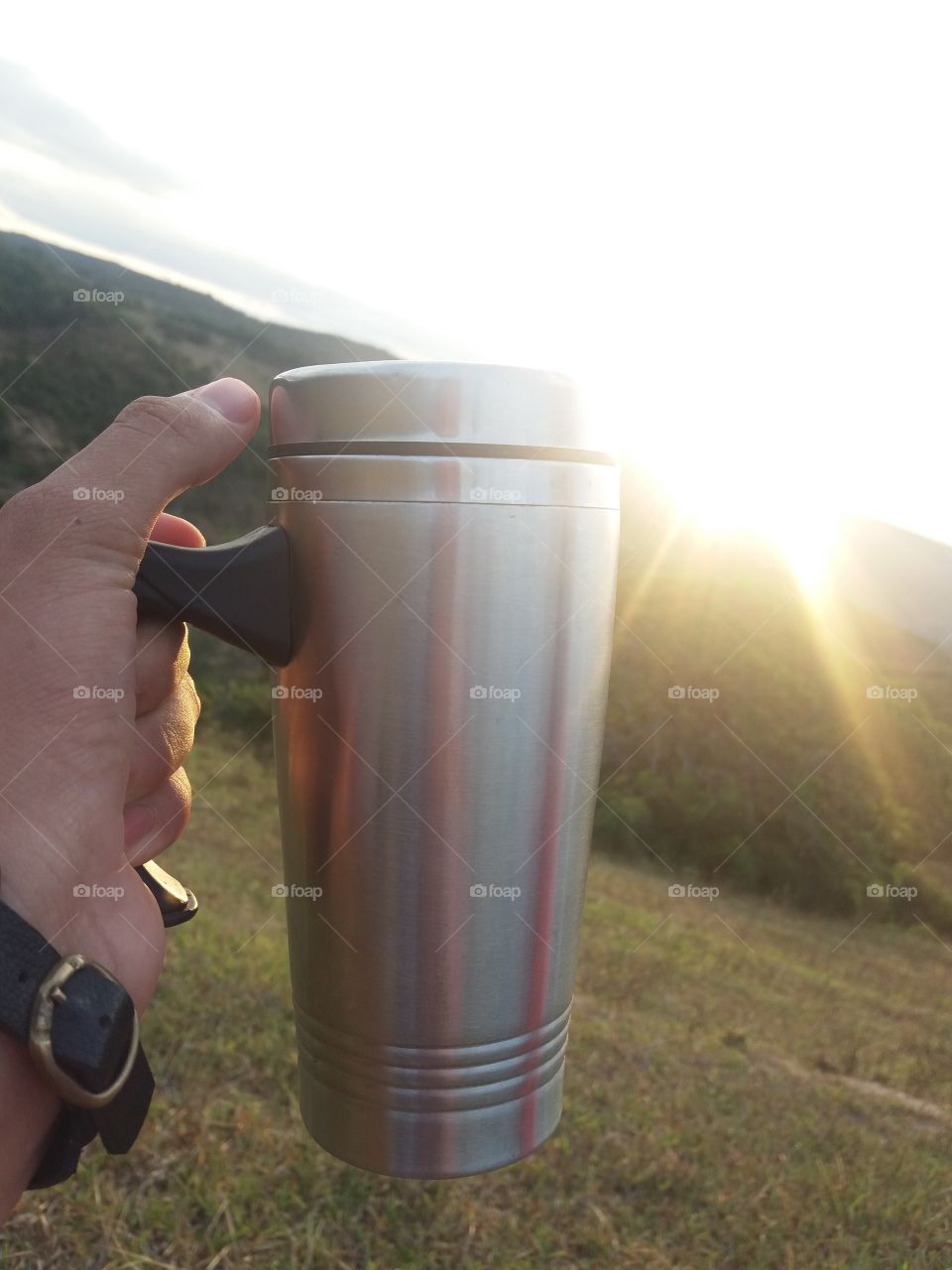 Um café e um bom nascer do sol.