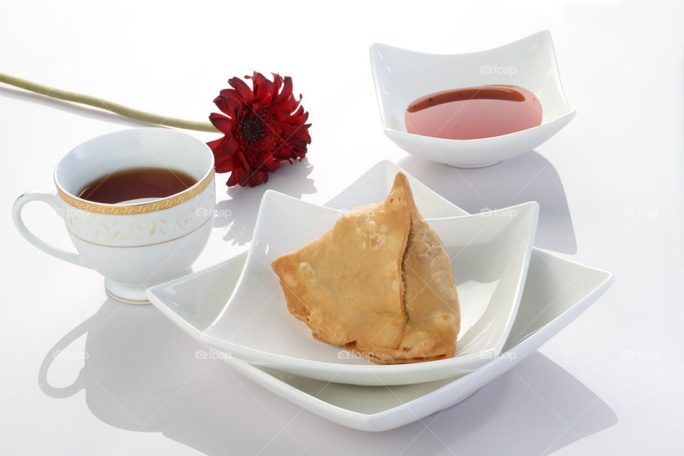 Indian food Samosa on white crockery