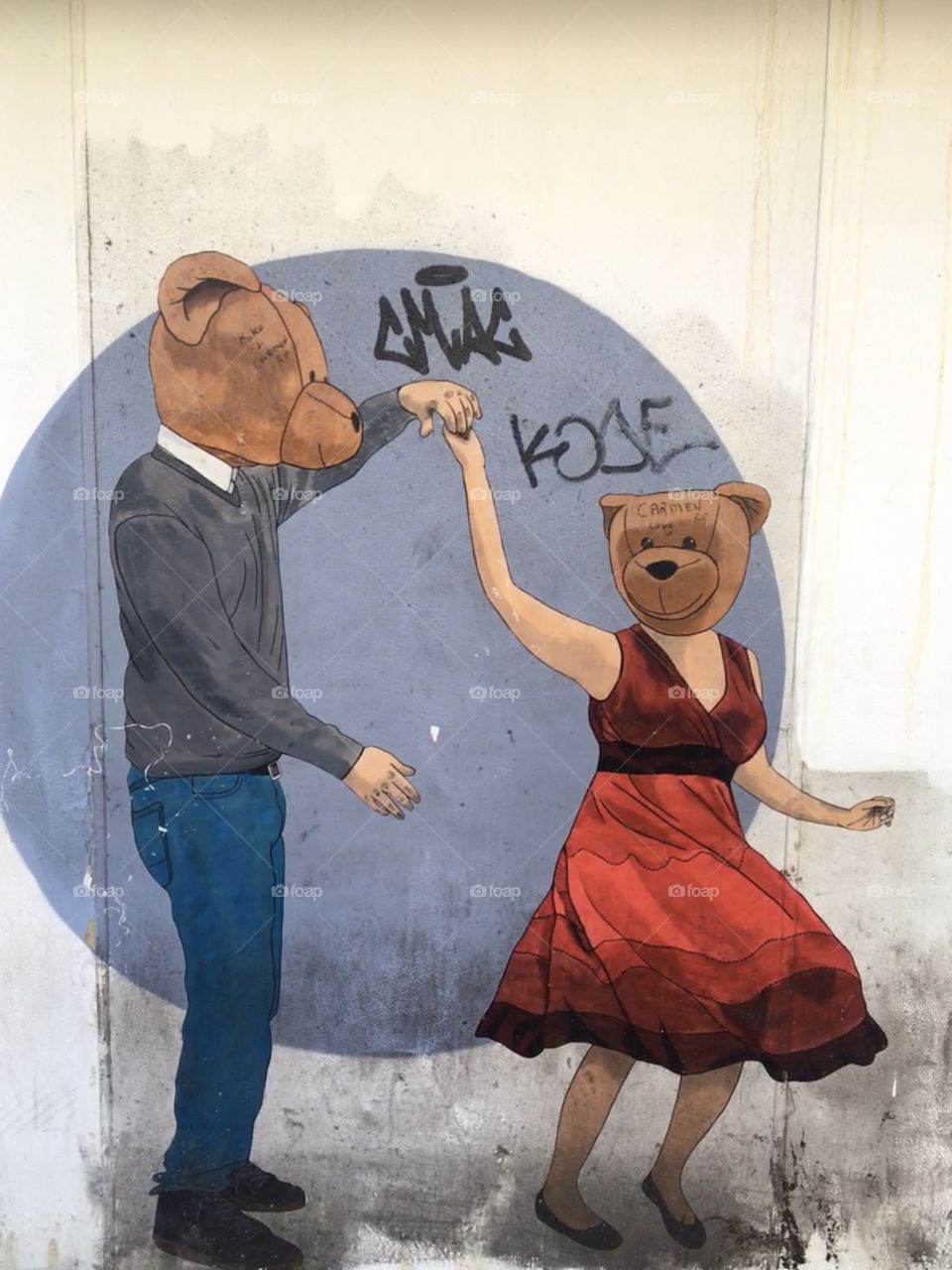 Dancing bear mural with graffiti 