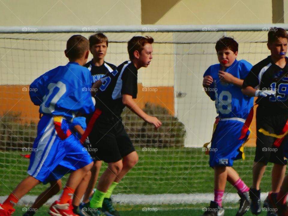 Kids Playing Flag Football
