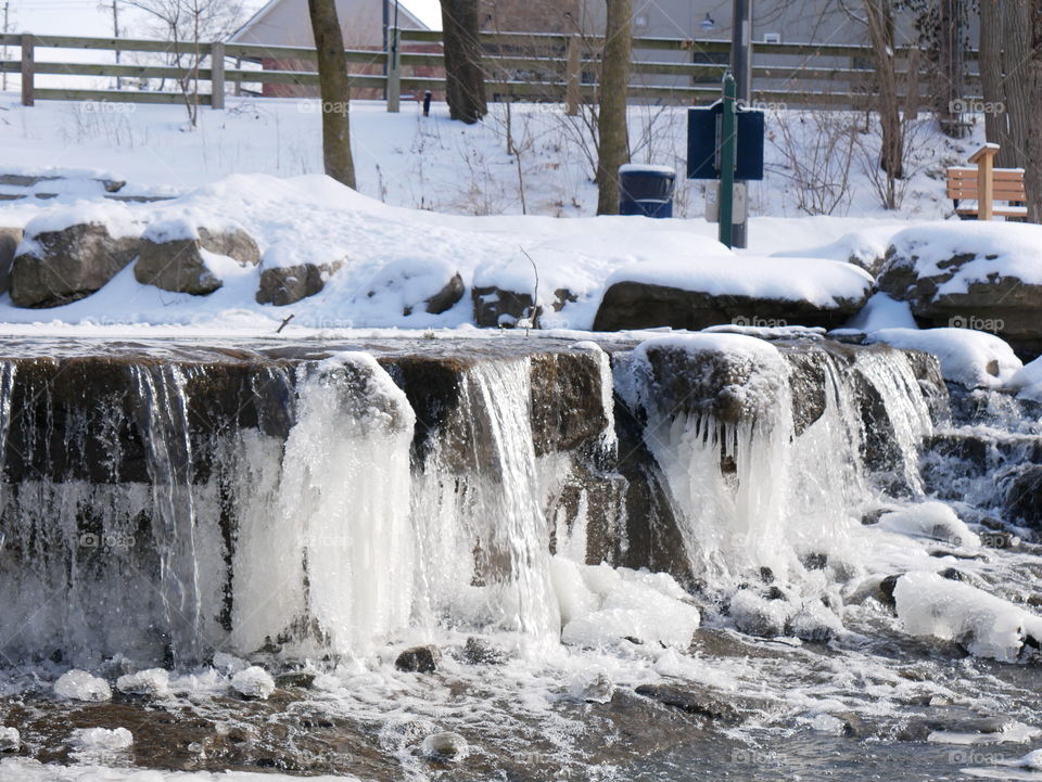 A walk through a winter wonderland, minutes into the local downtown area. Ice, snow, trees, water, and a little wildlife for good measure!