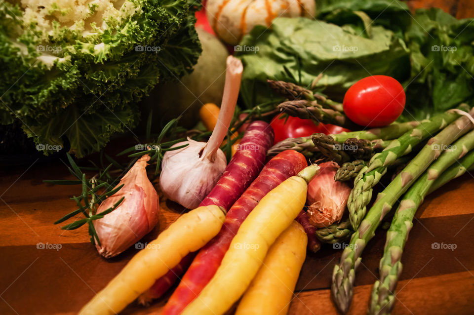 Autumn harvest vegetables on wood cutting board healthy fall cooking conceptual background 