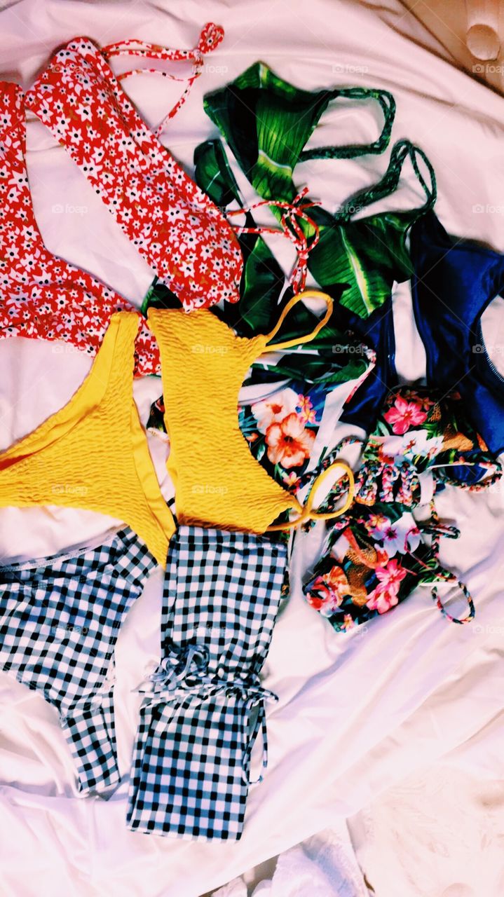 Beautiful collection of colorful bikinis.