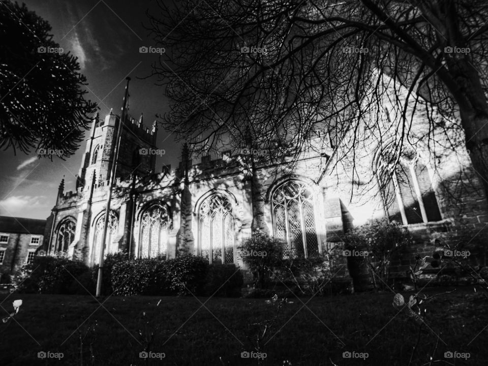 Church - Anglican Church of England traditional village parish church in the English Midlands Warwickshire England uk - edited in high contrast black and white 