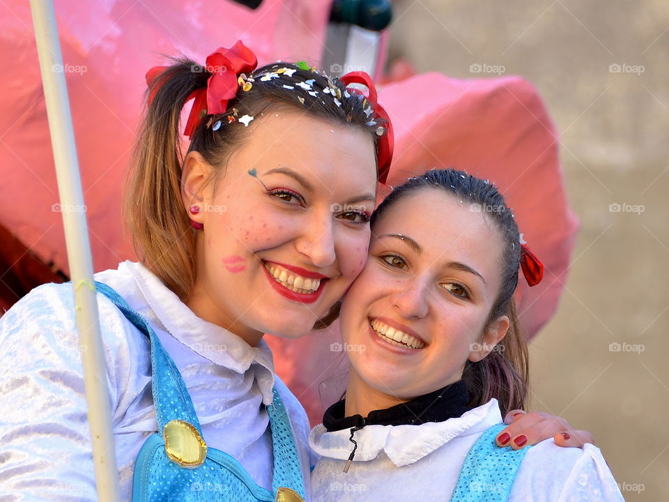 carnival parade, people smiling, portrait