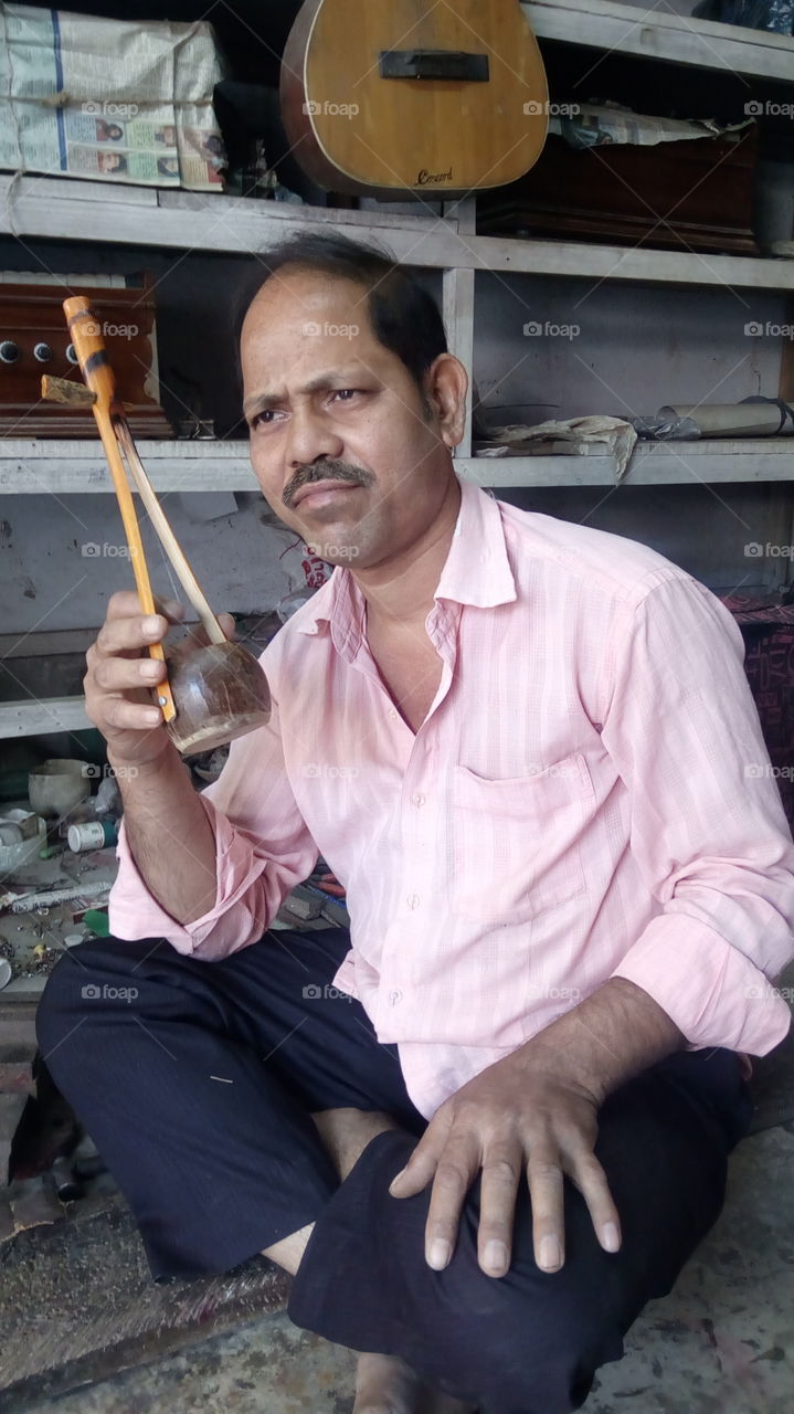 The man with aktara musical instrument