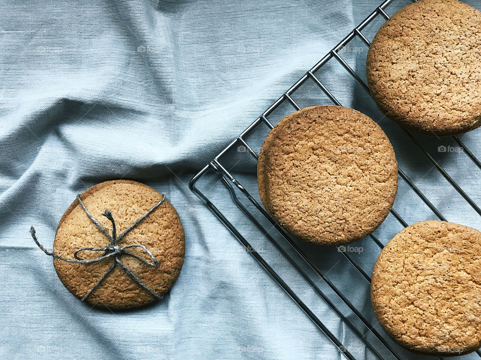 Homemade cookies on rustic textile background 