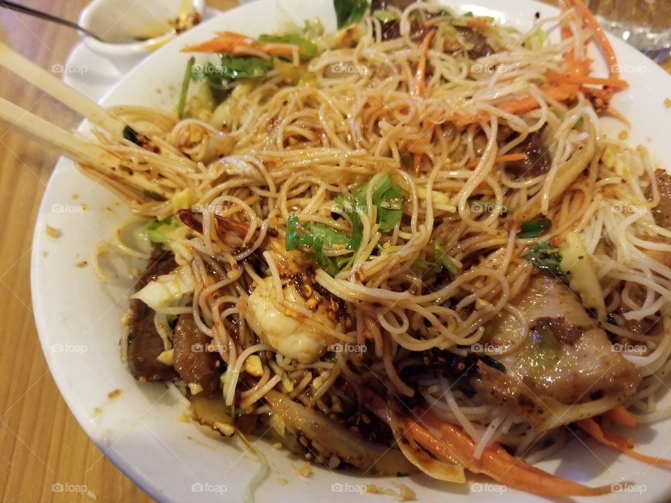 Delicious vietnamese pad thai at the noodle house served extra spicy.