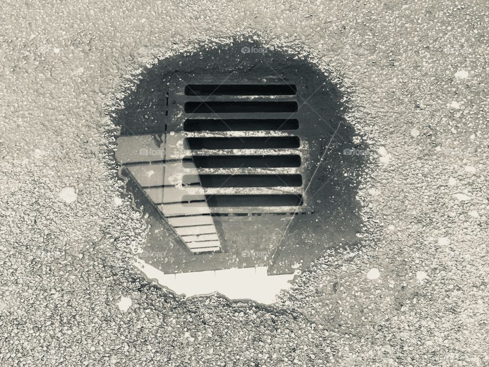 Overflowing drain on Bridle Path in Watford, Hertfordshire, in Spring.