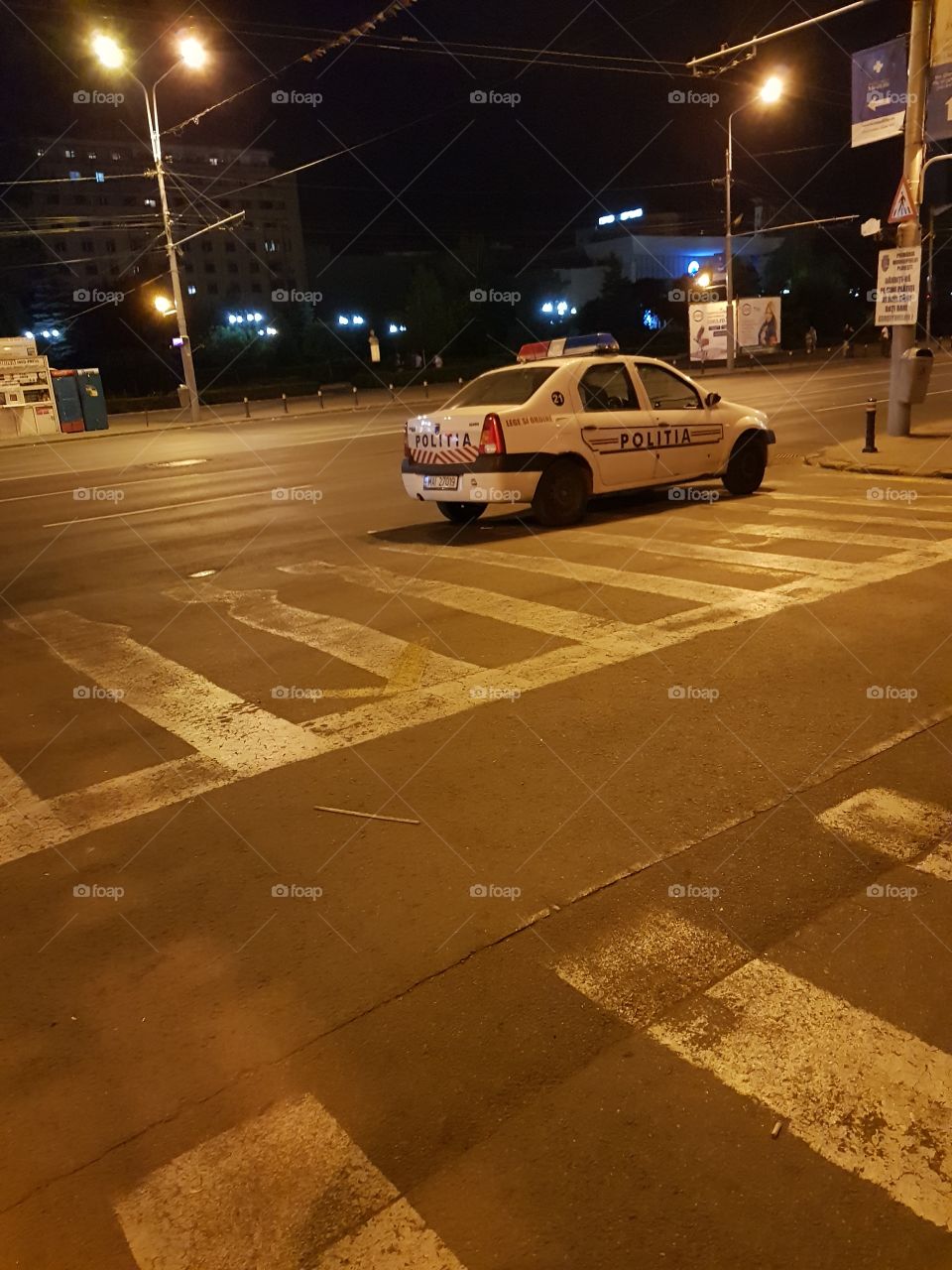 police car in the center of the city