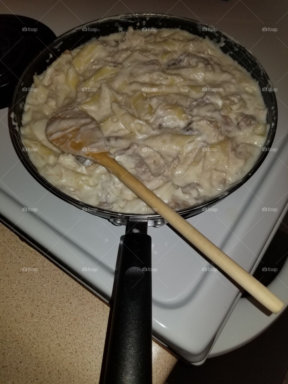 Turkey and penne pasta in cheese sauce
