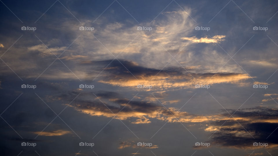 Fiery clouds on their way to an unknown destination.