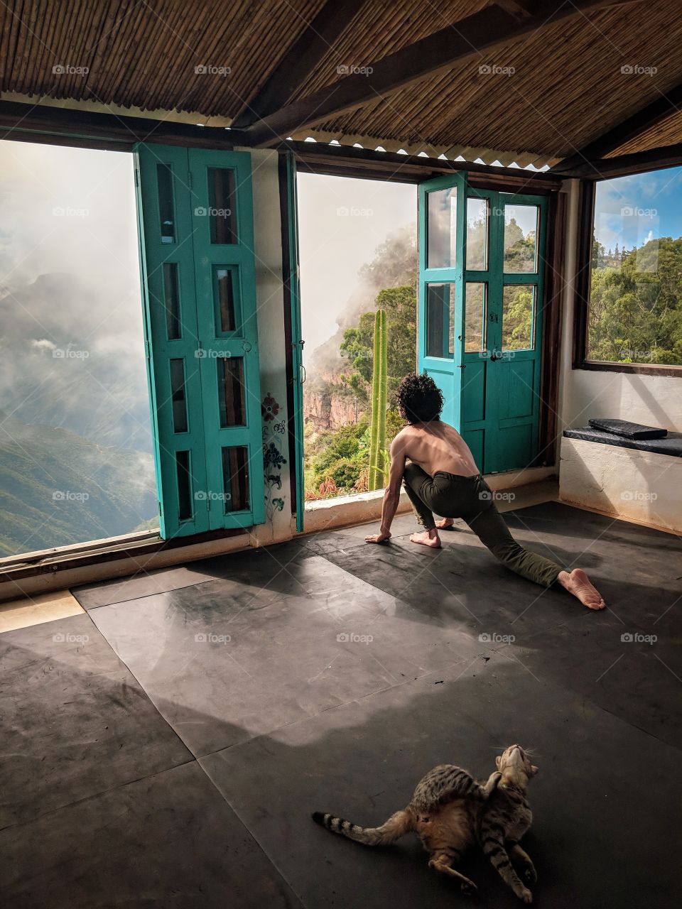 What better way to start the day, than with some morning yoga, in company of this cutie and with this amazing view