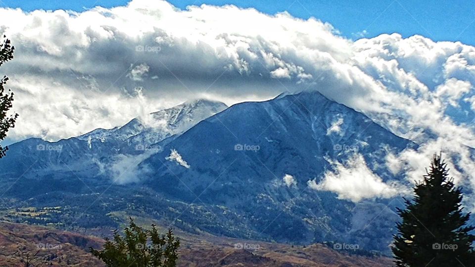Mt. Sopris wrapped in storm clouds.