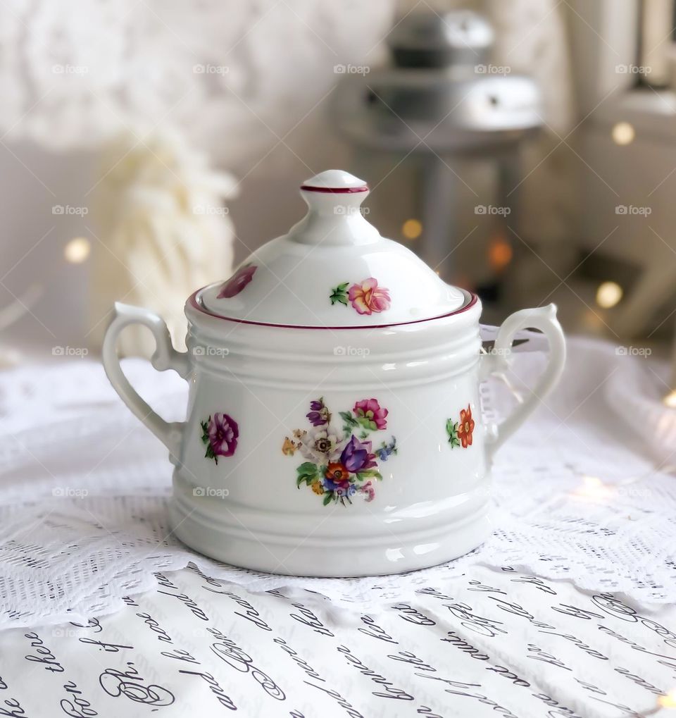 Antique porcelain sugar bowl with Meissen bouquet pattern