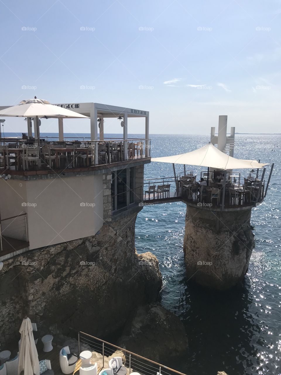 Luxury restaurant by the meadle of the azur sea