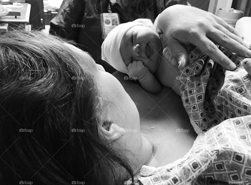Finally We Meet. A mother holds her newborn baby daughter for the first time