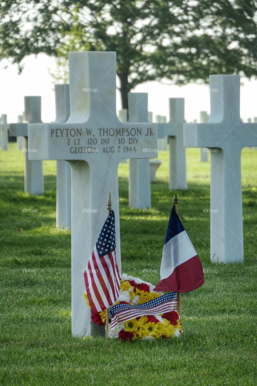 Flowery headstone at the Brittany American Cemetery of Saint-James