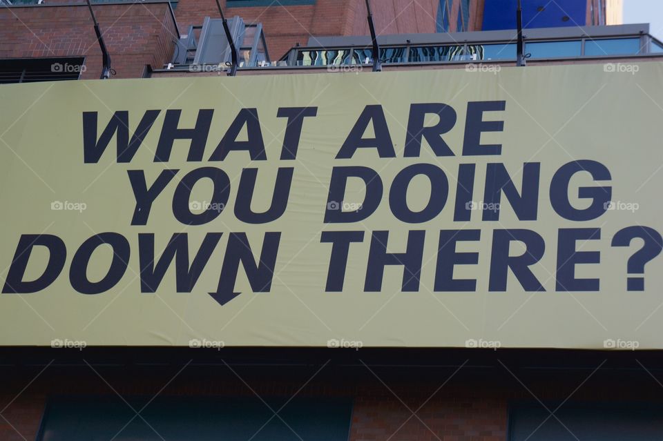 A church billboard asks the question "What are you doing down there? 




