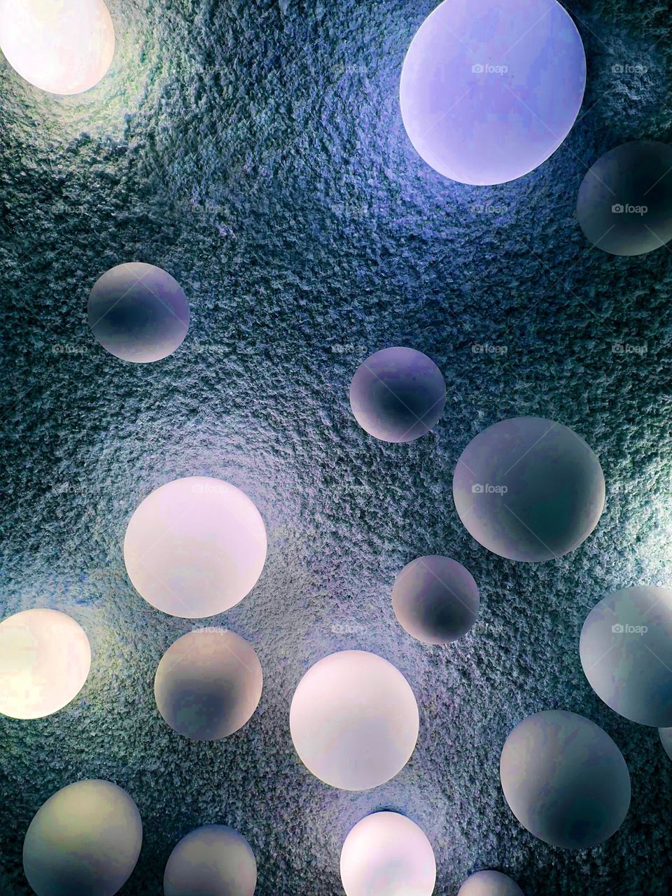 Balls on a blue background, close-up. Background. Abstraction