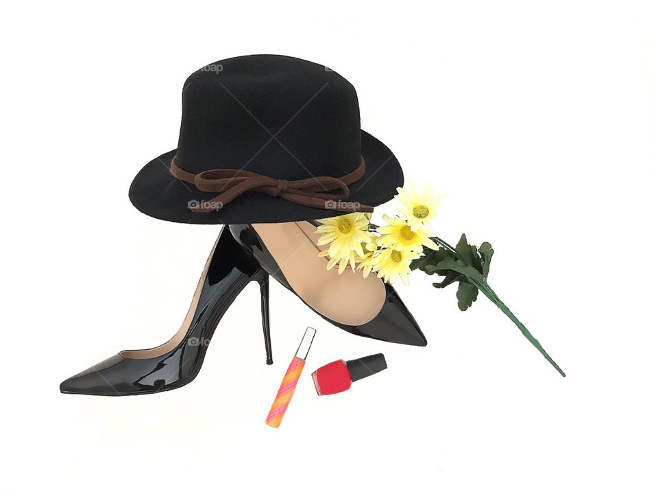 Stilettos and black hat fashion flat lay out.