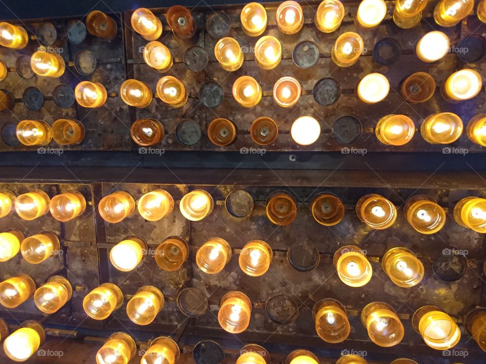 Light candles in church