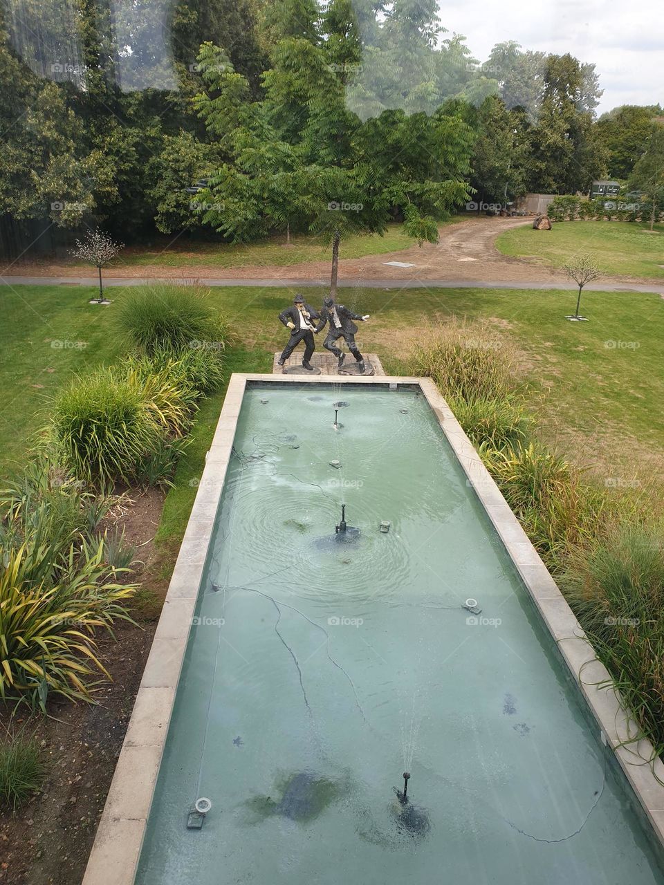 follow the rectangular pool to find the blues brothers