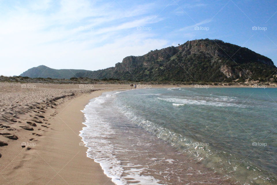Beautiful beach in Greece. Stunning sandy beach and warm waves 