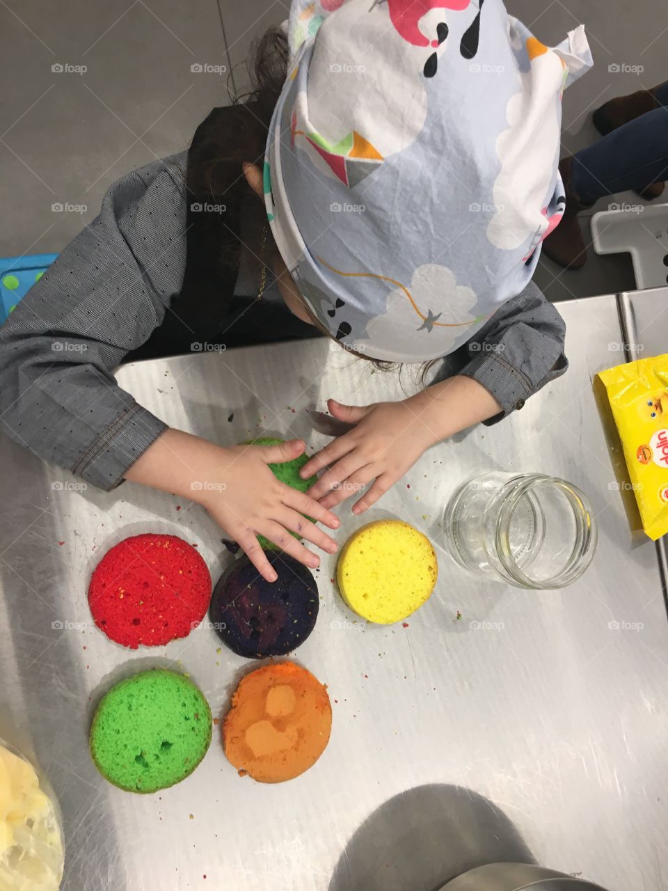 Colorful cakes and little chef