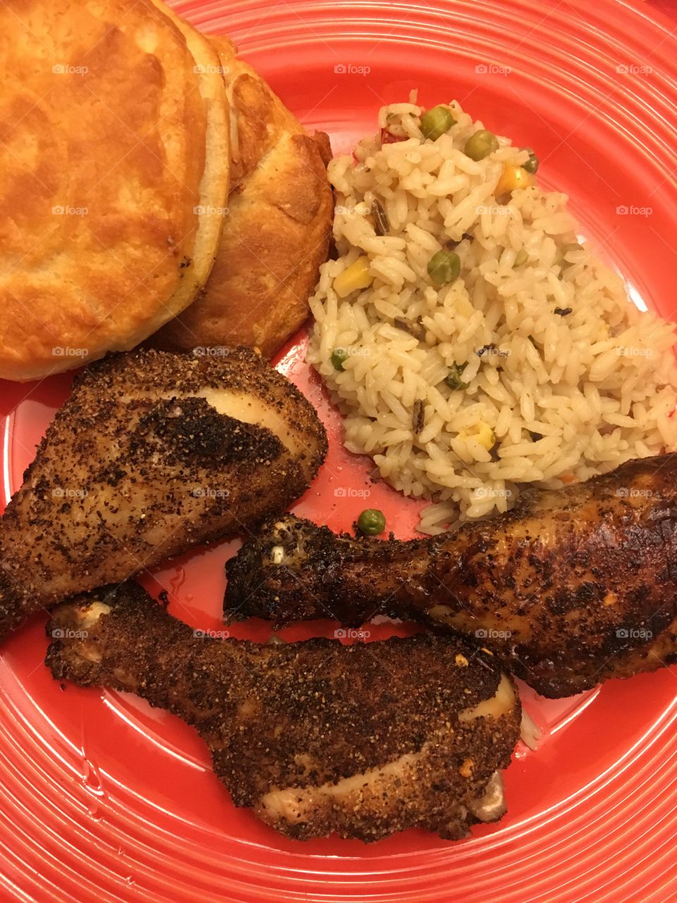 Drumsticks, rice, and biscuits