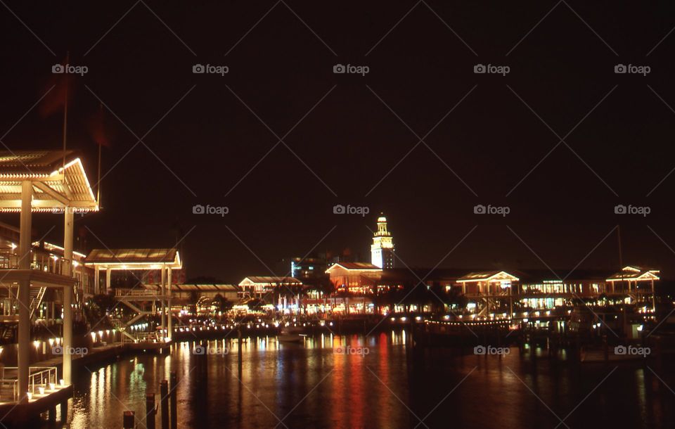 Biscayne Bay Miami Florida night time lights reflecting in the water