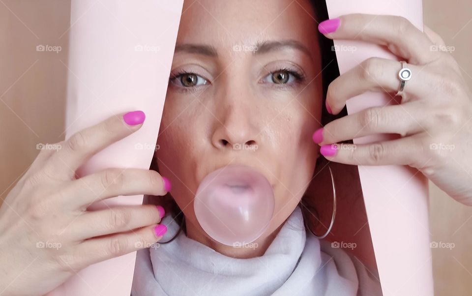 Woman Blowing Pink Bubble Gum