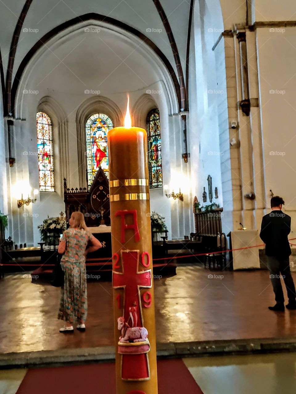 Candle in the temple. (Latvia, Riga, June, 2019).