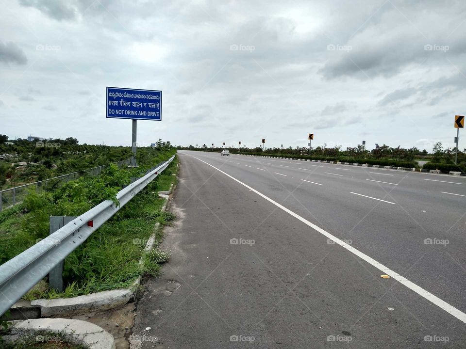 a sign board on the highway
