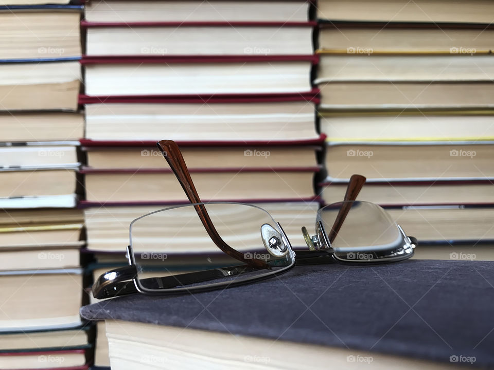 Glasses on closed book 