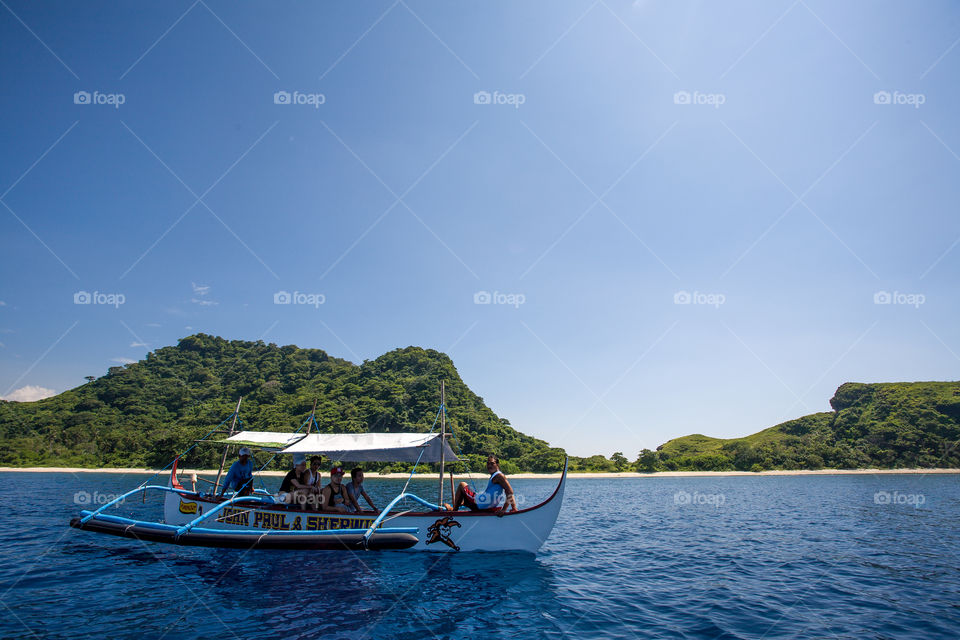 boat on a sea with tourists