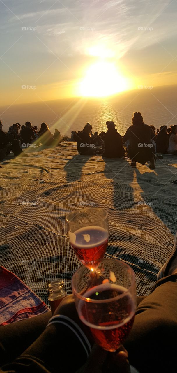 Champagne Picnic on Signal Hill, its like watching the Ocean swallow the Sun